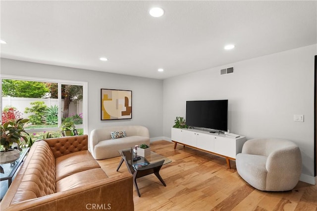 2008 N Capella Ct, Costa Mesa, CA 92626 - living area featuring light wood finished floors and recessed lighting