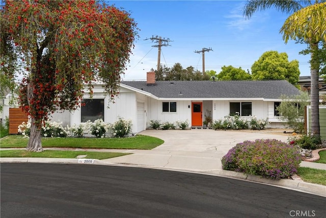 2008 N Capella Ct, Costa Mesa, CA 92626 - single story home with a chimney, an attached garage, concrete driveway, and a shingled roof