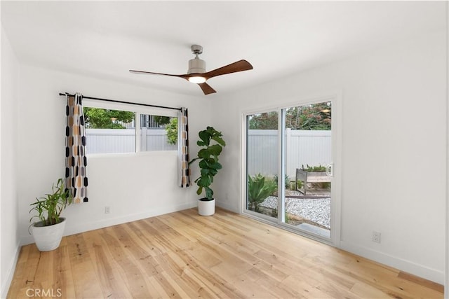 2008 N Capella Ct, Costa Mesa, CA 92626 - unfurnished room featuring wood finished floors, plenty of natural light, and ceiling fan