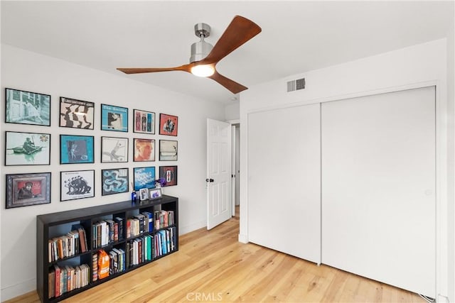 2008 N Capella Ct, Costa Mesa, CA 92626 - living area featuring a ceiling fan and wood finished floors