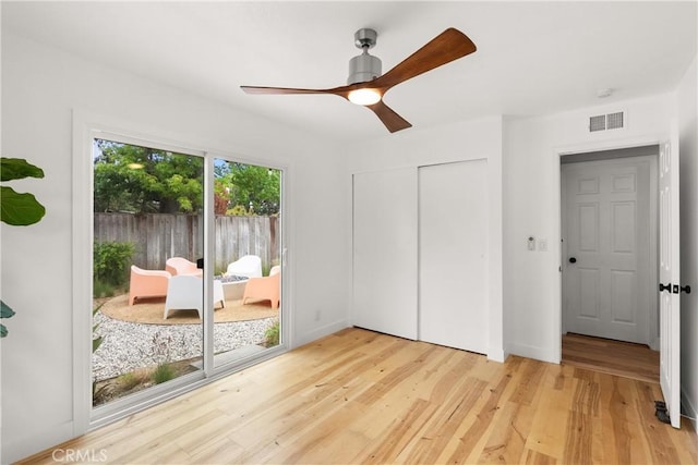 2008 N Capella Ct, Costa Mesa, CA 92626 - bedroom with light wood-type flooring, ceiling fan, and a closet