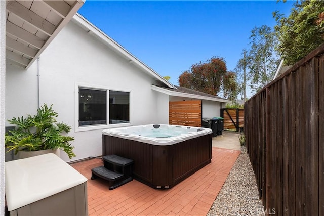 2008 N Capella Ct, Costa Mesa, CA 92626 - fenced backyard with a hot tub and a patio area