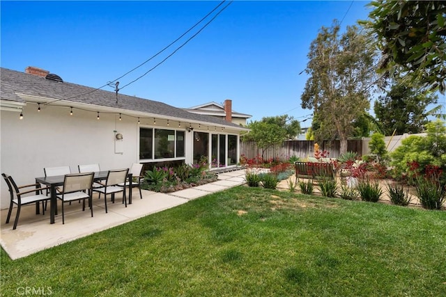 2008 N Capella Ct, Costa Mesa, CA 92626 - rear view of property featuring a fenced backyard, a patio area, and stucco siding