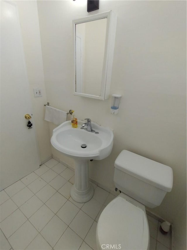 13410 Berg St, Sylmar, CA 91342 - bathroom featuring toilet and tile patterned flooring