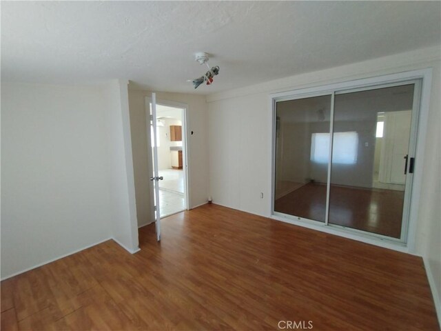 13410 Berg St, Sylmar, CA 91342 - spare room with wood finished floors