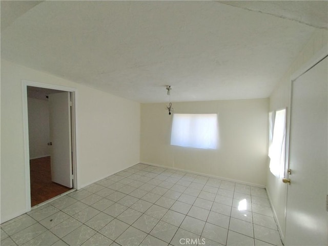 13410 Berg St, Sylmar, CA 91342 - empty room featuring light tile patterned flooring