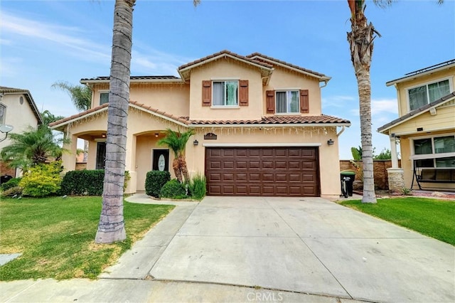 13203 Gyna Ln, La Puente, CA 91746 - mediterranean / spanish home with driveway, a front yard, a tile roof, and stucco siding