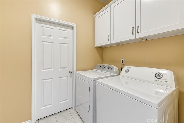 13203 Gyna Ln, La Puente, CA 91746 - washroom with separate washer and dryer and cabinet space