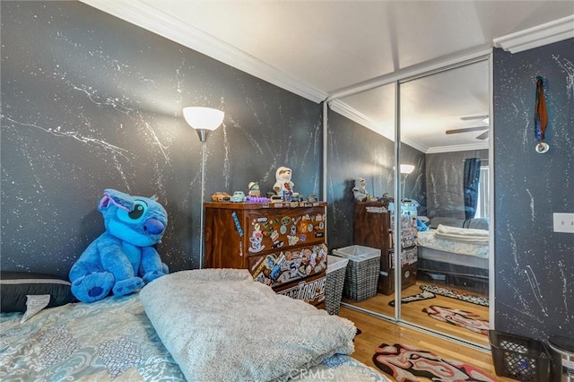 13203 Gyna Ln, La Puente, CA 91746 - bedroom featuring wood finished floors, ornamental molding, and a closet