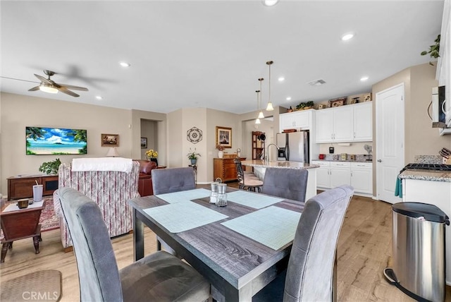 11444 River Run St, Apple Valley, CA 92308 - dining space with light wood-type flooring, a ceiling fan, and recessed lighting