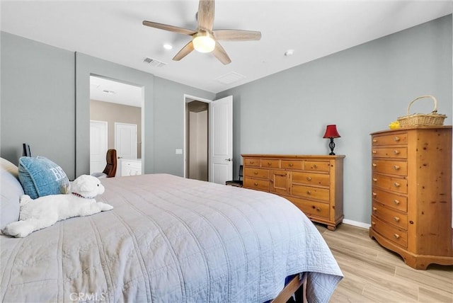 11444 River Run St, Apple Valley, CA 92308 - bedroom with light wood-style floors and a ceiling fan