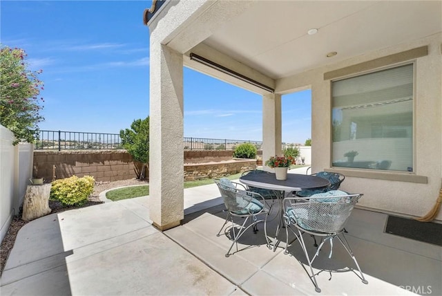11444 River Run St, Apple Valley, CA 92308 - fenced backyard with a patio area and outdoor dining area