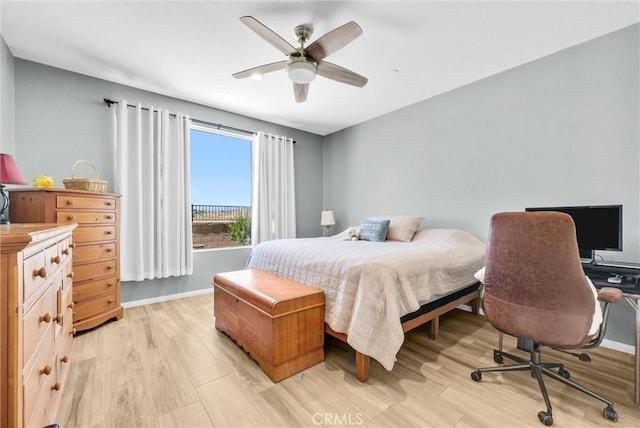 11444 River Run St, Apple Valley, CA 92308 - bedroom with light wood-type flooring and a ceiling fan