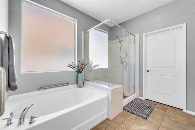 11444 River Run St, Apple Valley, CA 92308 - bathroom with a bath, a stall shower, and tile patterned floors