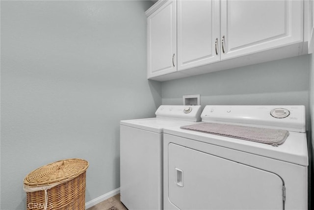 11444 River Run St, Apple Valley, CA 92308 - washroom featuring cabinet space, washer and clothes dryer, and light wood-style floors