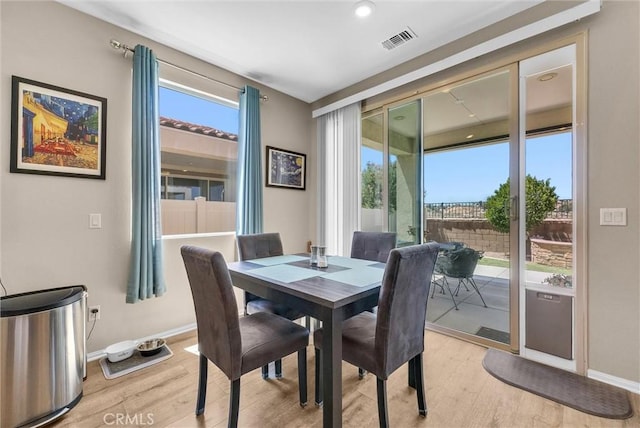 11444 River Run St, Apple Valley, CA 92308 - dining space featuring light wood finished floors and baseboards