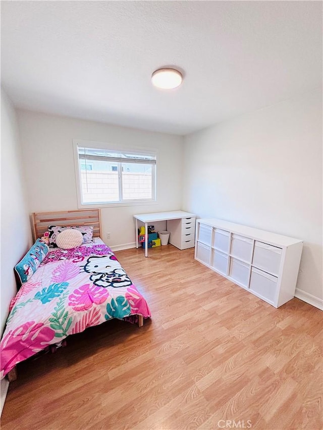 10349 Victoria St, Rancho Cucamonga, CA 91701 - bedroom featuring wood finished floors and baseboards