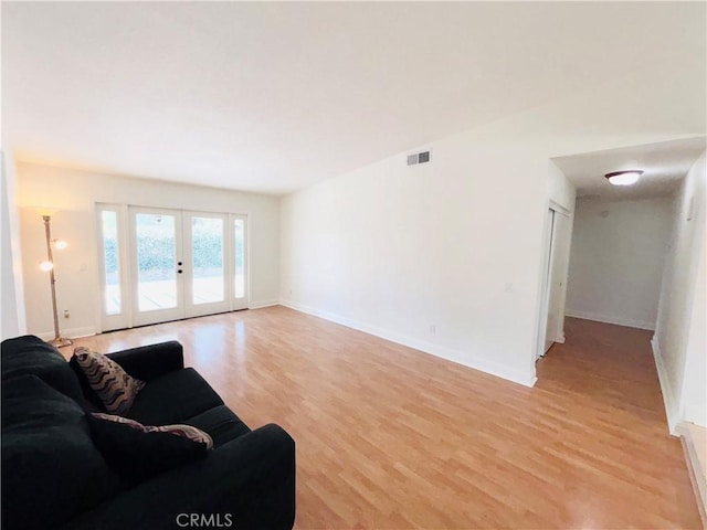 10349 Victoria St, Rancho Cucamonga, CA 91701 - living room featuring light wood-type flooring and french doors