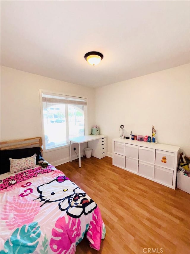 10349 Victoria St, Rancho Cucamonga, CA 91701 - bedroom featuring light wood finished floors and baseboards