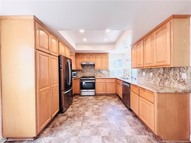 10349 Victoria St, Rancho Cucamonga, CA 91701 - kitchen featuring appliances with stainless steel finishes, light brown cabinetry, decorative backsplash, a tray ceiling, and under cabinet range hood
