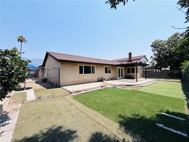 10349 Victoria St, Rancho Cucamonga, CA 91701 - rear view of property with a patio, a fenced backyard, and stucco siding