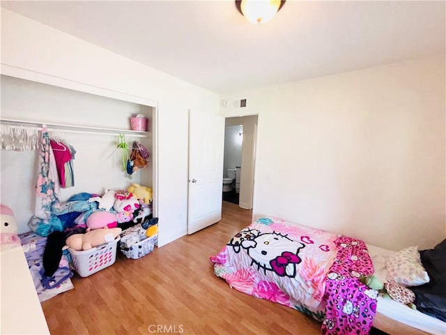 10349 Victoria St, Rancho Cucamonga, CA 91701 - bedroom featuring wood finished floors and a closet