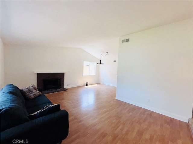 10349 Victoria St, Rancho Cucamonga, CA 91701 - living room with light wood-style flooring and a brick fireplace