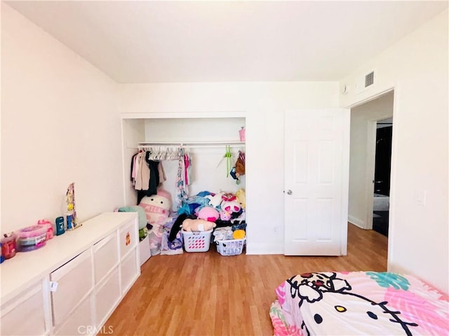 10349 Victoria St, Rancho Cucamonga, CA 91701 - bedroom featuring a closet and light wood-type flooring