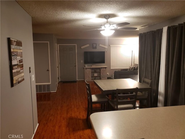 811 Cinnamon Ln, Duarte, CA 91010 - dining area with a ceiling fan, a textured ceiling, and dark wood finished floors