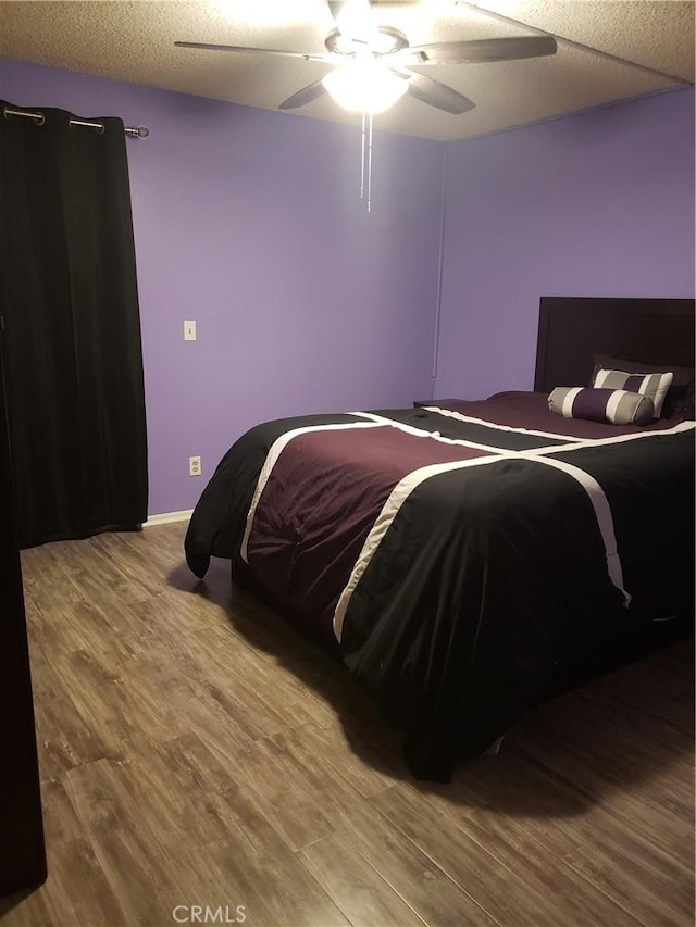 811 Cinnamon Ln, Duarte, CA 91010 - bedroom with wood finished floors and a ceiling fan
