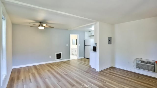 1000 W Macarthur Blvd Unit 57, Santa Ana, CA 92707 - unfurnished room featuring light wood-style flooring, ceiling fan, and a wall mounted AC