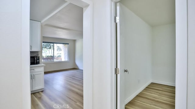 1000 W Macarthur Blvd Unit 57, Santa Ana, CA 92707 - corridor with light wood-type flooring and baseboards