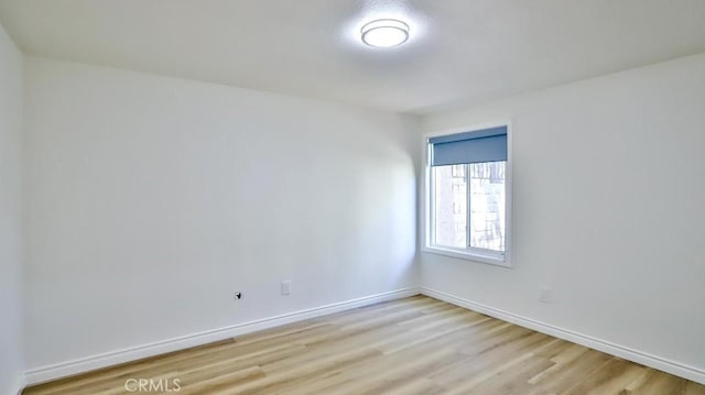 1000 W Macarthur Blvd Unit 57, Santa Ana, CA 92707 - empty room featuring light wood-type flooring and baseboards