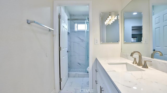 1000 W Macarthur Blvd Unit 57, Santa Ana, CA 92707 - full bathroom with marble look tile flooring, a marble finish shower, vanity, and recessed lighting