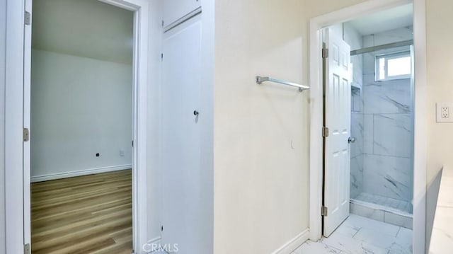 1000 W Macarthur Blvd Unit 57, Santa Ana, CA 92707 - bathroom featuring a marble finish shower and marble finish flooring