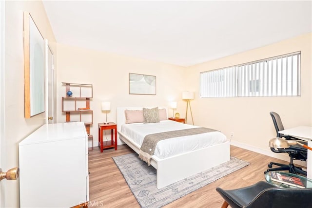 6160 Whitsett Ave Unit 4, North Hollywood, CA 91606 - bedroom with light wood-type flooring and an office area