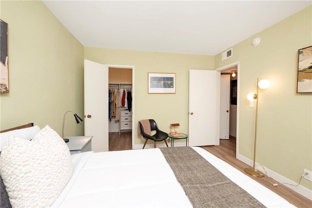 6160 Whitsett Ave Unit 4, North Hollywood, CA 91606 - bedroom featuring wood finished floors and a spacious closet