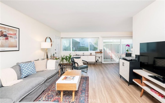 6160 Whitsett Ave Unit 4, North Hollywood, CA 91606 - living area featuring wood finished floors and plenty of natural light