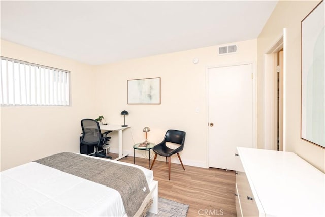 6160 Whitsett Ave Unit 4, North Hollywood, CA 91606 - bedroom with light wood-style floors and baseboards