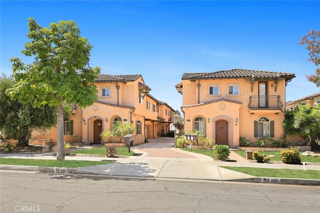 156 El Dorado St Unit B, Arcadia, CA 91006 - mediterranean / spanish home featuring a balcony, stucco siding, and a tiled roof