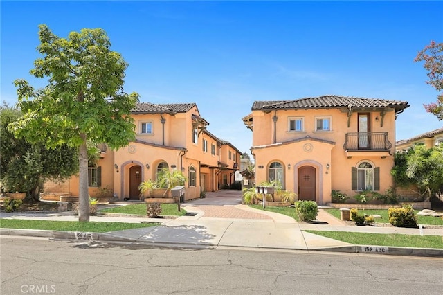 156 El Dorado St Unit B, Arcadia, CA 91006 - mediterranean / spanish home featuring a balcony, stucco siding, and a tiled roof
