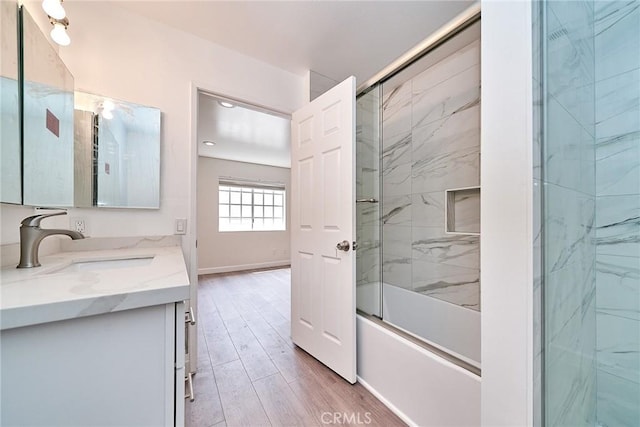 15832 Apollo Pl, Gardena, CA 90249 - full bath with vanity, combined bath / shower with glass door, and wood finished floors