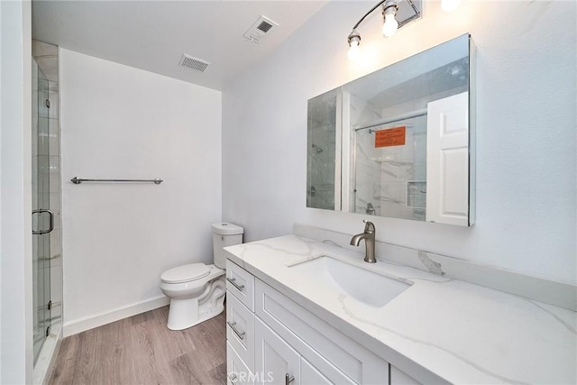 15832 Apollo Pl, Gardena, CA 90249 - bathroom featuring vanity, a marble finish shower, and wood finished floors