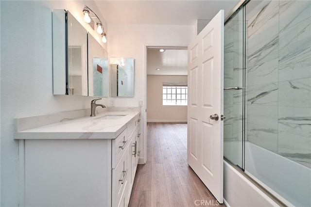 15832 Apollo Pl, Gardena, CA 90249 - bathroom with vanity, combined bath / shower with glass door, wood finished floors, and recessed lighting