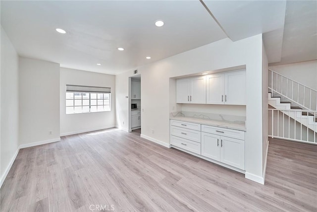 15832 Apollo Pl, Gardena, CA 90249 - bar area with light wood-style floors, stairs, and recessed lighting