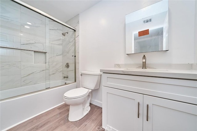 15832 Apollo Pl, Gardena, CA 90249 - bathroom with wood finished floors, vanity, and combined bath / shower with glass door