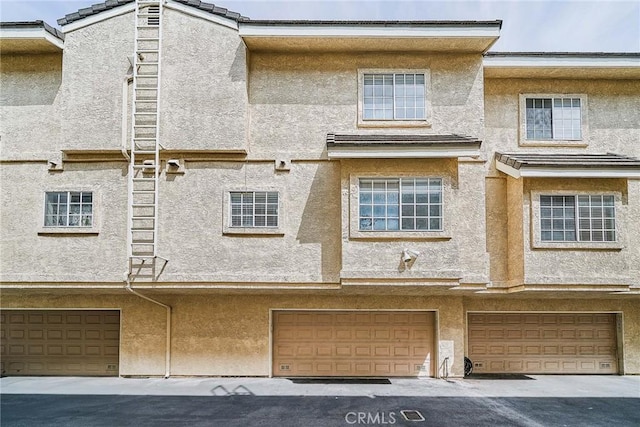 15832 Apollo Pl, Gardena, CA 90249 - back of property featuring stucco siding and an attached garage