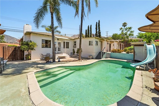 7314 Summitrose St, Tujunga, CA 91042 - view of pool with a water slide and a patio