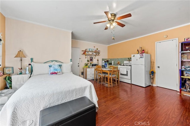 7314 Summitrose St, Tujunga, CA 91042 - bedroom featuring freestanding refrigerator, dark wood-style flooring, crown molding, and ceiling fan