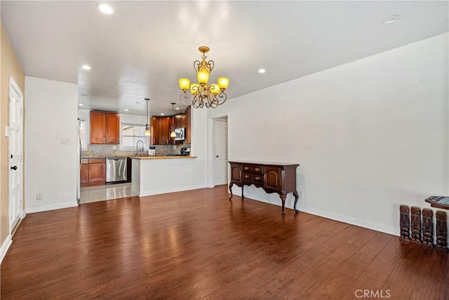 7314 Summitrose St, Tujunga, CA 91042 - living room featuring a chandelier, wood finished floors, and recessed lighting